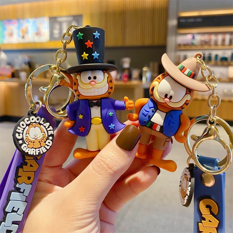 ガーフィールド漫画バックパックチェーンカーアクセスキーチェー - Car Accessories To Buy のレビューと価格