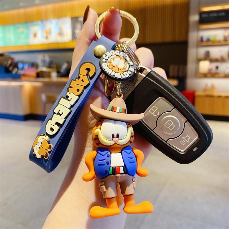 ガーフィールド漫画バックパックチェーンカーアクセスキーチェー - Car Accessories To Buy のレビューと価格