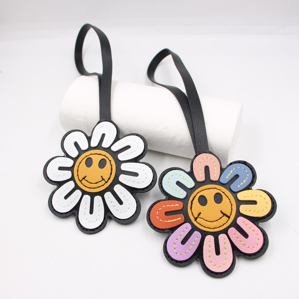 1個のひまわりの楽しい顔の花のキーホルダー、フェイクレザーの - Car Accessories Gift Ideas のレビューと価格
